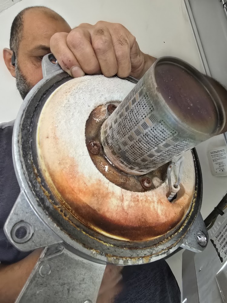Boiler burner and heat exchanger door removed for cleaning